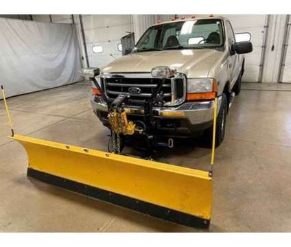 2001 Ford F-250 Super Duty is a Gold, Tan 2001 Ford F-250 Super Duty Car for Sale in East Dubuque IL