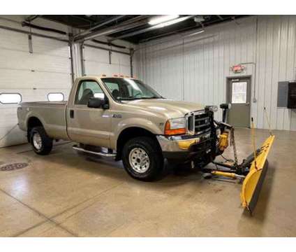 2001 Ford F-250 Super Duty XLT Reg Cab is a Gold, Tan 2001 Ford F-250 Super Duty Car for Sale in East Dubuque IL