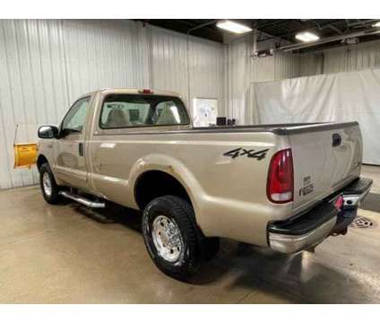 2001 Ford F-250 Super Duty XLT Reg Cab is a Gold, Tan 2001 Ford F-250 Super Duty Car for Sale in East Dubuque IL