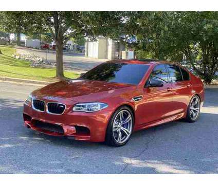 2016 BMW M5 for sale is a Orange 2016 BMW M5 Car for Sale in Frederick MD