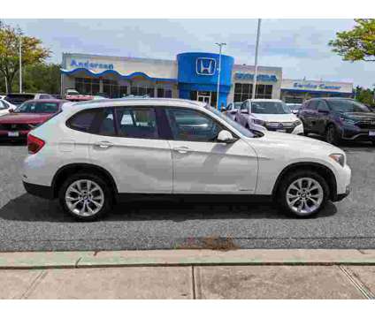 2014UsedBMWUsedX1UsedAWD 4dr is a White 2014 BMW X1 Car for Sale in Cockeysville MD