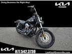 This car is a 2016 Harley-Davidson Dyna with low mileage of