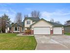 Wonderfully cared-for home in a desirable Spokane Valley locale