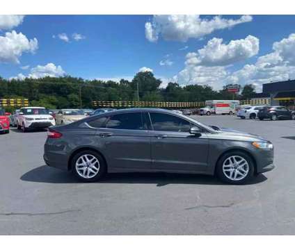 2015 Ford Fusion for sale is a Grey 2015 Ford Fusion Car for Sale in Tyler TX