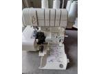 Baby Lock Imagine serger with jet air threading technology. Excellent condition!