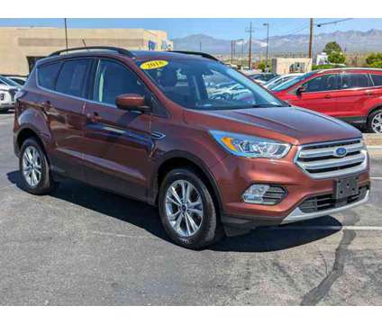 2018 Ford Escape SEL is a Red 2018 Ford Escape SEL SUV in Green Valley AZ