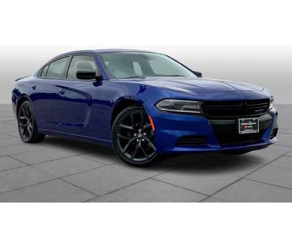 2021UsedDodgeUsedChargerUsedRWD is a Blue 2021 Dodge Charger Car for Sale in Houston TX