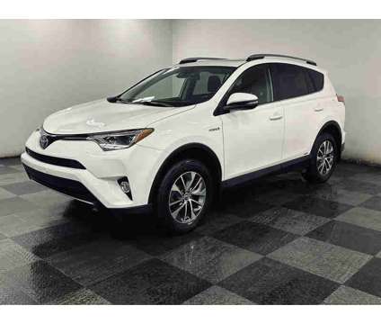 2017UsedToyotaUsedRAV4 HybridUsedAWD (Natl) is a White 2017 Toyota RAV4 Hybrid Hybrid in Brunswick OH