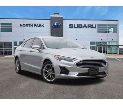 2020 Ford Fusion SEL is a Silver 2020 Ford Fusion SEL Car for Sale in San Antonio TX