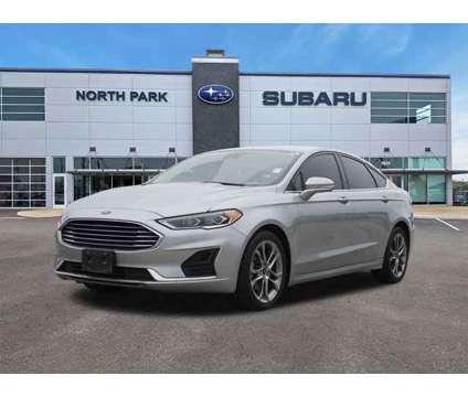 2020 Ford Fusion SEL is a Silver 2020 Ford Fusion SEL Car for Sale in San Antonio TX