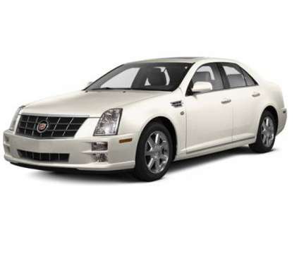 2010 Cadillac STS AWD w/1SB is a Red 2010 Cadillac STS Car for Sale in Lomira WI