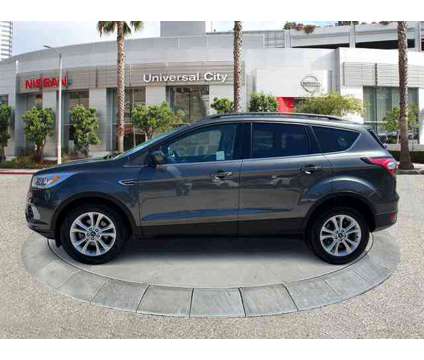 2018 Ford Escape SEL is a Grey 2018 Ford Escape SEL Car for Sale in Los Angeles CA