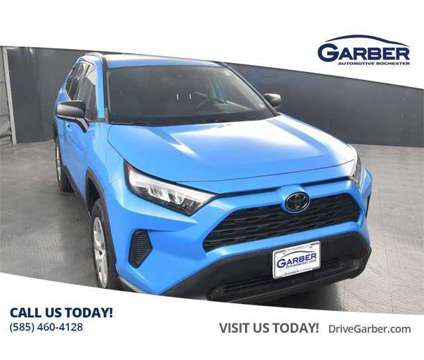 2019 Toyota RAV4 LE is a Blue 2019 Toyota RAV4 LE SUV in Rochester NY