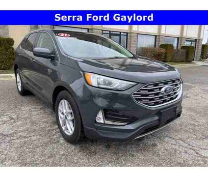 2021 Ford Edge SEL is a Grey 2021 Ford Edge Car for Sale in Traverse City MI