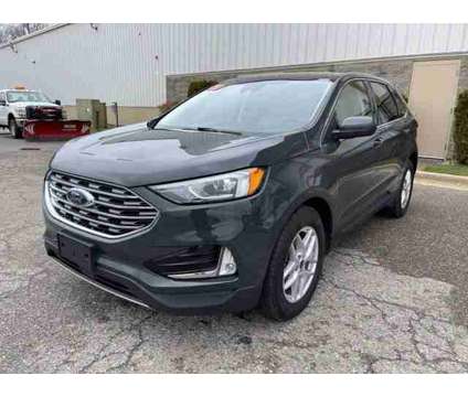 2021 Ford Edge SEL is a Grey 2021 Ford Edge Car for Sale in Traverse City MI