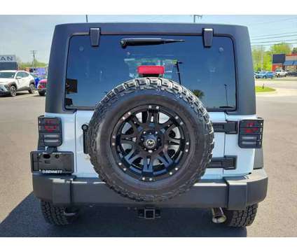 2015 Jeep Wrangler Unlimited Sport is a White 2015 Jeep Wrangler Unlimited Sport SUV in Lebanon PA