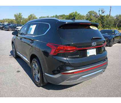 2021 Hyundai Santa Fe SEL is a Black 2021 Hyundai Santa Fe SUV in Leesburg FL
