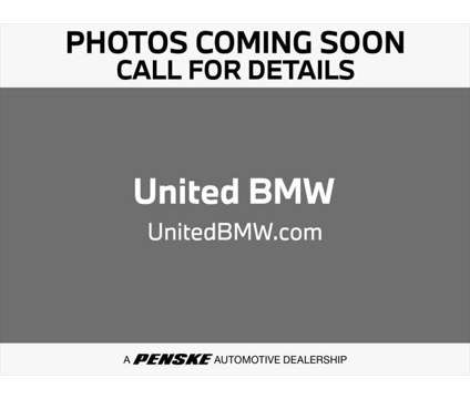2025 BMW iX xDrive50 is a Red 2025 BMW 325 Model iX SUV in Alpharetta GA