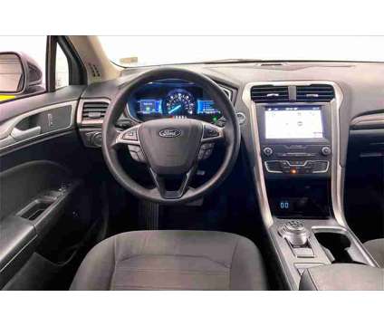 2019 Ford Fusion Hybrid SE is a Black 2019 Ford Fusion Hybrid SE Hybrid in Fredericksburg VA