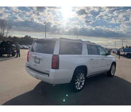 2019 Chevrolet Suburban Premier is a White 2019 Chevrolet Suburban Premier SUV in Houghton Lake MI