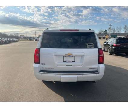 2019 Chevrolet Suburban Premier is a White 2019 Chevrolet Suburban Premier SUV in Houghton Lake MI