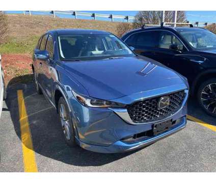 2024 Mazda CX-5 2.5 S Premium Package is a Blue 2024 Mazda CX-5 SUV in Shrewsbury MA
