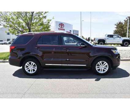 2018 Ford Explorer XLT 4WD is a Red 2018 Ford Explorer XLT SUV in Plover WI