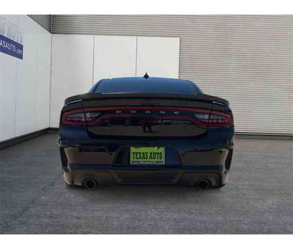 2022 Dodge Charger R/T Scat Pack Widebody is a Black 2022 Dodge Charger R/T Scat Pack Sedan in Houston TX