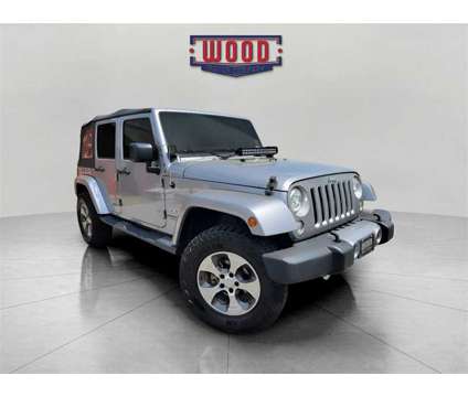 2017 Jeep Wrangler Unlimited Sahara is a Silver 2017 Jeep Wrangler Unlimited Sahara SUV in Harrison AR