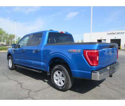 2021 Ford F-150 XLT is a Blue 2021 Ford F-150 XLT Truck in Bentonville AR