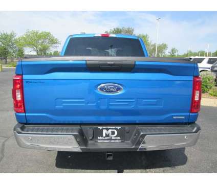 2021 Ford F-150 XLT is a Blue 2021 Ford F-150 XLT Truck in Bentonville AR
