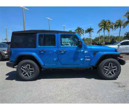 2024 Jeep Wrangler Sahara is a Blue 2024 Jeep Wrangler Sahara SUV in Naples FL