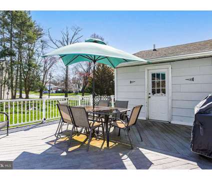 Move-in Ready. Great Deck. Hardwood Floor Home. Updated Kitchen &amp; BRs in Cherry Hill NJ is a Single-Family Home