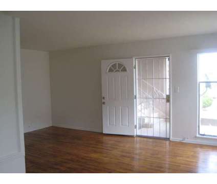 Two bedroom apartment at 7027 Ramsgate Place in Los Angeles CA is a Apartment