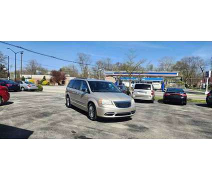 2013 Chrysler Town &amp; Country for sale is a Tan 2013 Chrysler town &amp; country Car for Sale in Urbana IL
