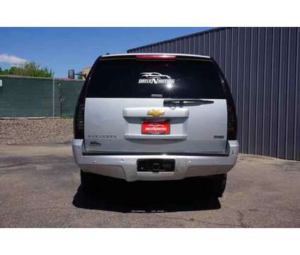 2012 Chevrolet Suburban 1500 for sale is a Silver 2012 Chevrolet Suburban 1500 Trim Car for Sale in Greeley CO