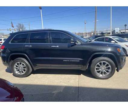 2014 Jeep Grand Cherokee Limited is a Black 2014 Jeep grand cherokee Limited Car for Sale in Des Moines IA
