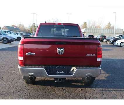 2015 Ram 1500 Big Horn is a Red 2015 RAM 1500 Model Big Horn Car for Sale in Traverse City MI
