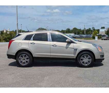 2013 Cadillac SRX Luxury is a Silver 2013 Cadillac SRX Car for Sale in Sarasota FL