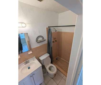 Private room for rent with private bathroom at 196 Nw 34th Ave in Lauderhill FL is a Roommate