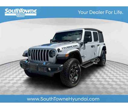 2022 Jeep Wrangler Unlimited Rubicon 4xe is a Silver 2022 Jeep Wrangler Unlimited Rubicon SUV in Newnan GA
