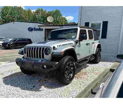 2022 Jeep Wrangler Unlimited Rubicon 4xe is a Silver 2022 Jeep Wrangler Unlimited Rubicon SUV in Newnan GA