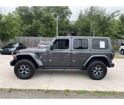 2018 Jeep Wrangler Unlimited Rubicon is a Grey 2018 Jeep Wrangler Unlimited Rubicon SUV in Dallas TX