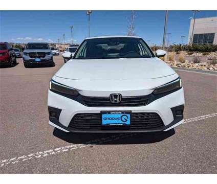 2024 Honda Civic Touring is a Silver, White 2024 Honda Civic Touring Sedan in Colorado Springs CO