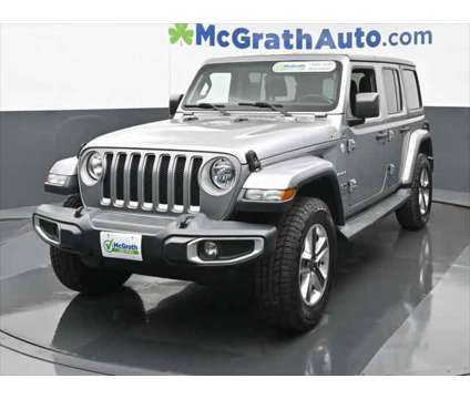 2020 Jeep Wrangler Unlimited Sahara 4X4 is a Silver 2020 Jeep Wrangler Unlimited Sahara SUV in Dubuque IA