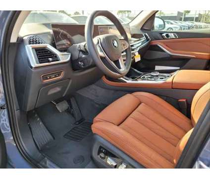 2025 BMW X7 xDrive40i is a Gold 2025 SUV in Jacksonville FL