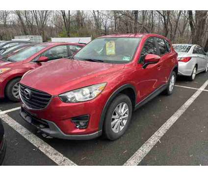 2016 Mazda CX-5 Touring is a Red 2016 Mazda CX-5 Touring SUV in Doylestown PA