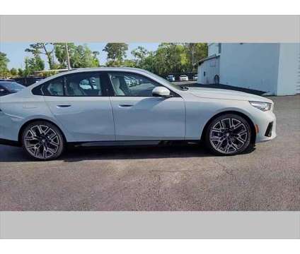 2024 BMW 5 Series i is a Grey 2024 BMW 5-Series Sedan in Jacksonville FL