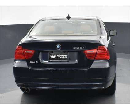 2010 BMW 3 Series xDrive is a Blue 2010 BMW 3-Series Sedan in Mcdonough GA