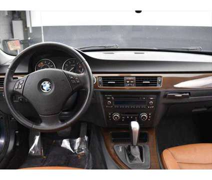 2010 BMW 3 Series xDrive is a Blue 2010 BMW 3-Series Sedan in Mcdonough GA